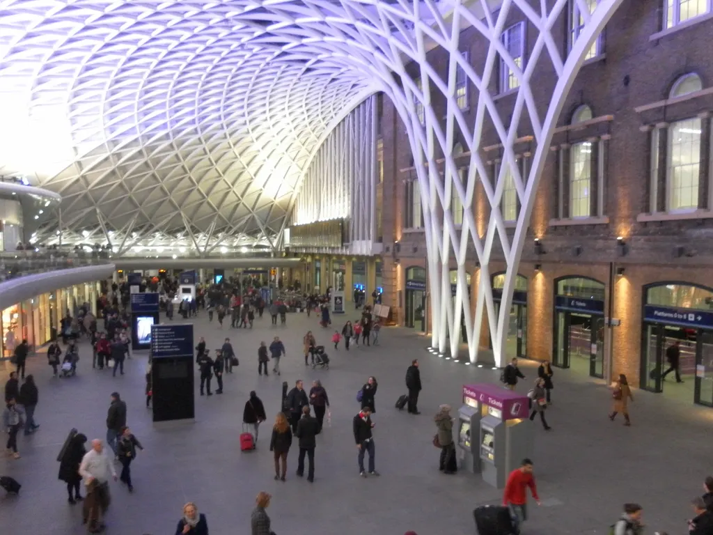 The lattice roof and funnel column of the Western Concourse at King's Cross station