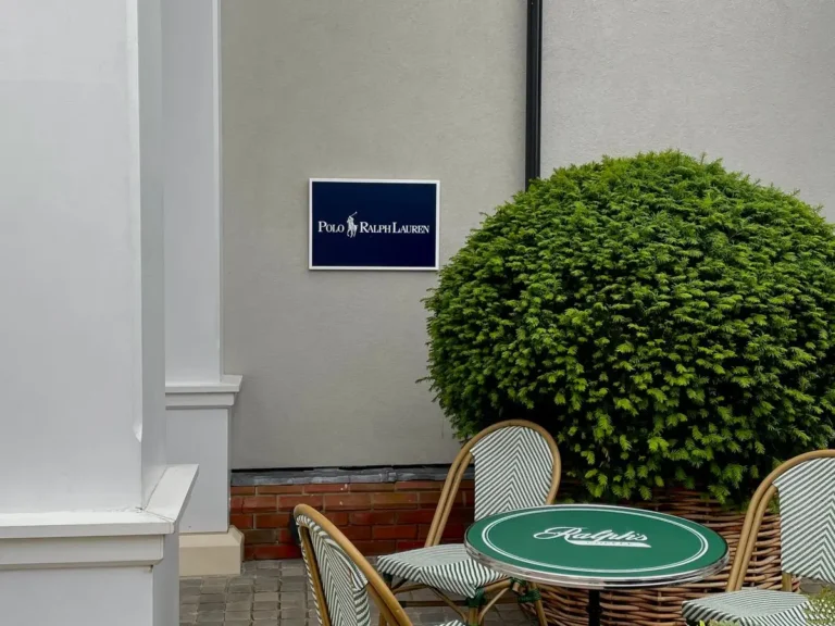 Café tables outside the Polo Ralph Lauren boutique at Bicester Village