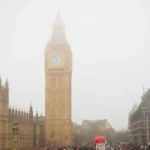 Big Ben and a London street scene in thick winter fog