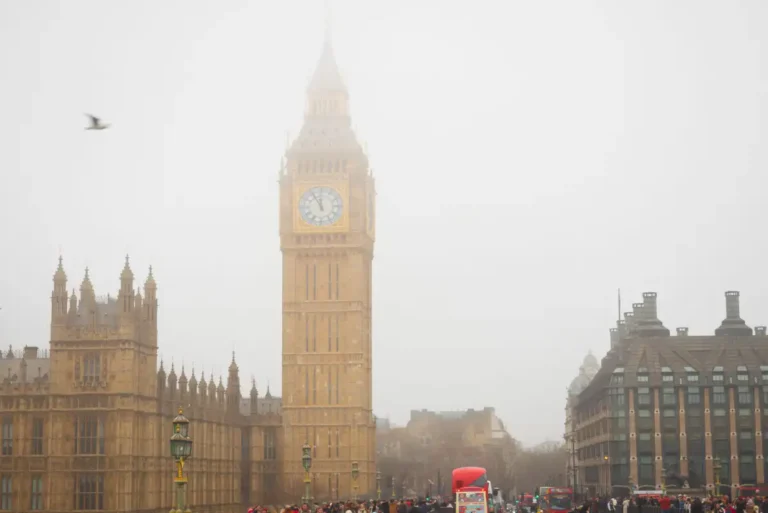 Big Ben and a London street scene in thick winter fog