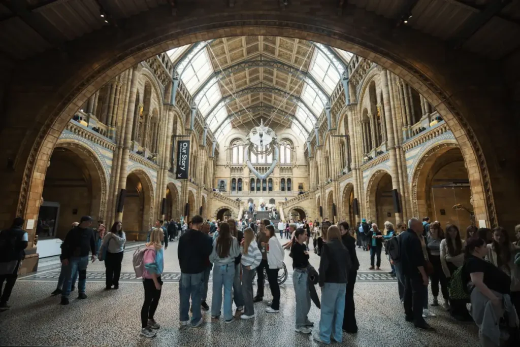Visitors inside a London museum gallery on a winter afternoon