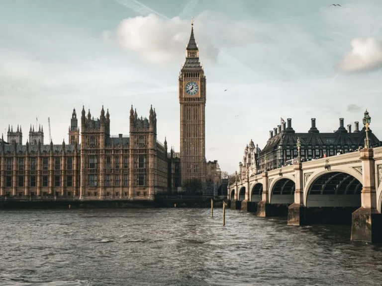 Big Ben and the Houses of Parliament beside Westminster Bridge seen across the Thames