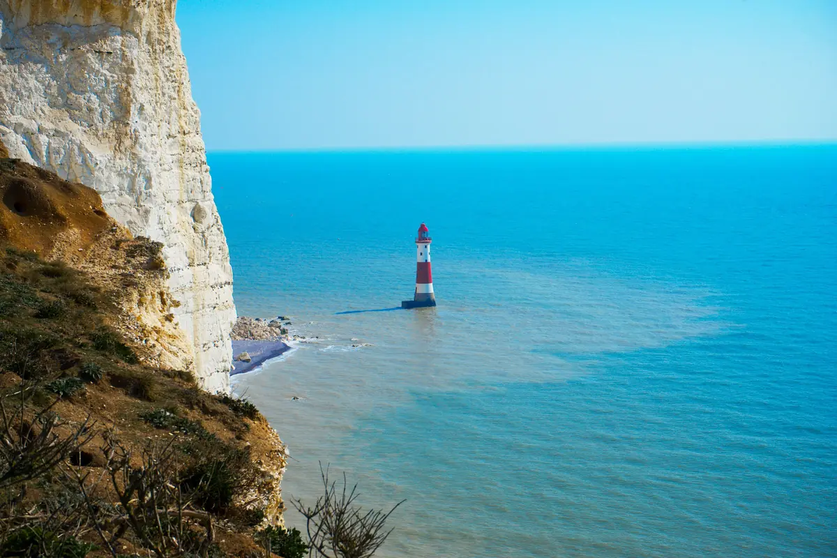 Beachy Head lighthouse below the chalk cliffs, the last viewpoint before the drive back to London