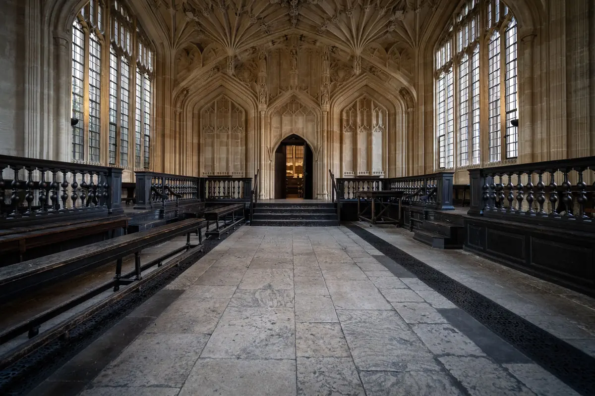The fan-vaulted Divinity School inside the Bodleian Library, seen on the Oxford day trip from London