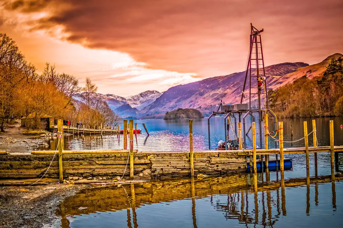 Wooden jetty on Ullswater at sunset in the Lake District