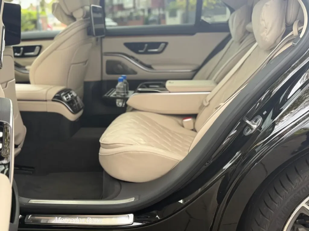 Light leather rear seat in a Tripyana Mercedes S-Class