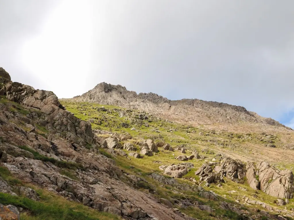 Rocky mountainside and green slopes in Eryri (Snowdonia), the scenery of the Llanberis Pass drive